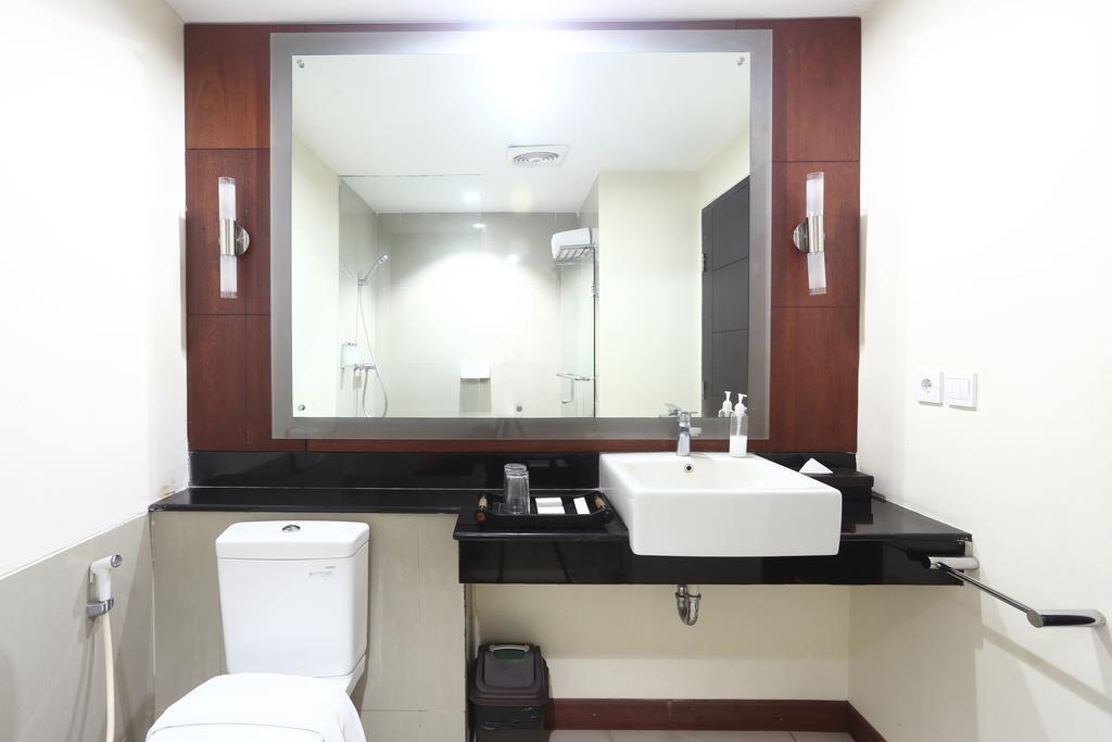 Zen Rooms Legian Dewi Sri Кута Стая снимка